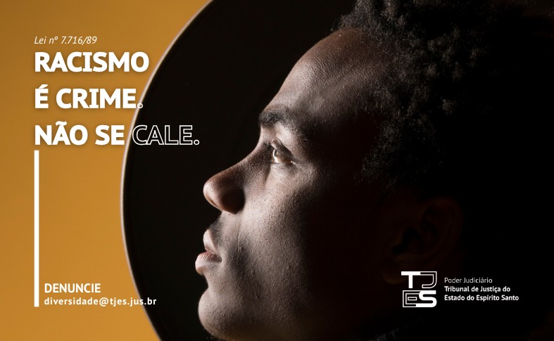 Pessoa negra com o texto Racismo é crime. Denuncia. diversidade@tjes.jus.br