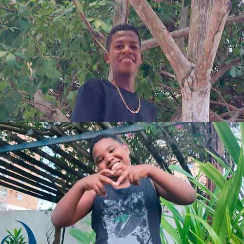 Montagem com as fotos dos irmãos Estânio e Guilherme. Ambos os irmão tem a pele negra, vestem blusa estampada e sorriem para a câmera.